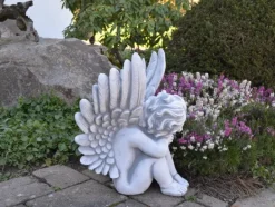 Gartendekoparadies Enfants & Anges-Ange assis avec des ailes