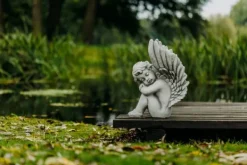 Gartendekoparadies Enfants & Anges-Ange assis avec des ailes