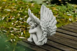 Gartendekoparadies Enfants & Anges-Ange assis avec des ailes