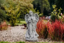 Gartendekoparadies Enfants & Anges-Cet ange se tient fermement sur un rocher