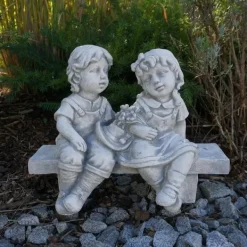 Gartendekoparadies Enfants & Anges-Deux figures d'enfants sur le banc