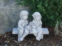 Gartendekoparadies Enfants & Anges-Deux figures d'enfants sur le banc