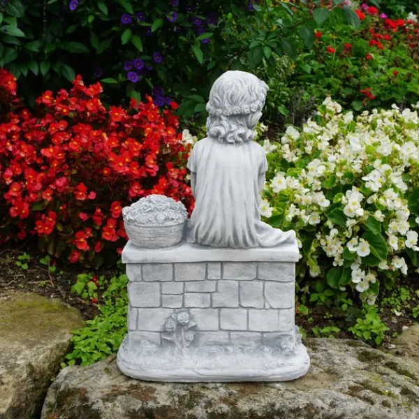 Gartendekoparadies Enfants & Anges-Figure de petite fille sur le mur de briques