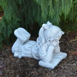 Gartendekoparadies Enfants & Anges-Fille couchée avec un livre