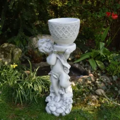 Gartendekoparadies Belle|Jardinières-Garçon avec un pot de fleurs