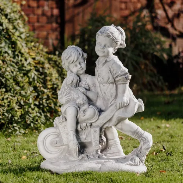 Gartendekoparadies Enfants & Anges-Garçon et fille avec brouette