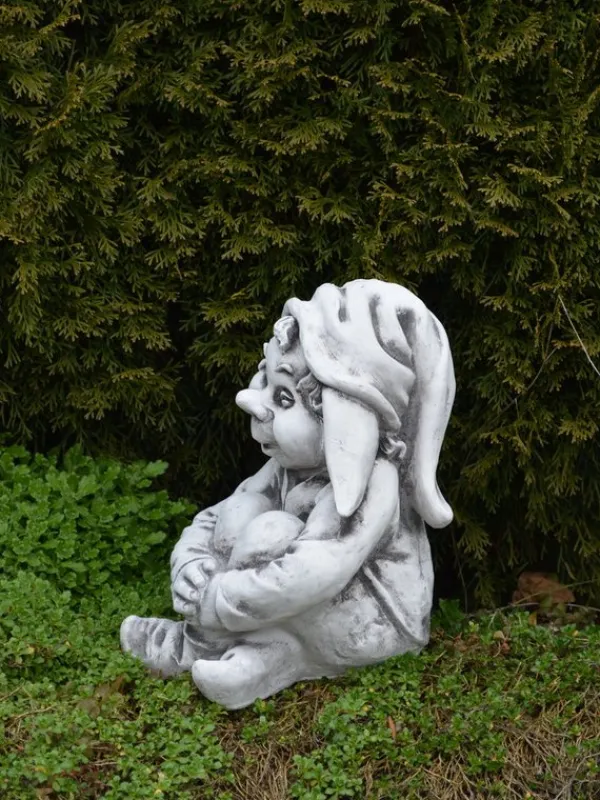 Gartendekoparadies Gnome-Gnome est assis dans le jardin et attend