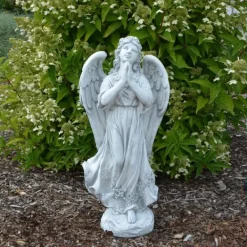 Gartendekoparadies Enfants & Anges-La figure d'ange se tient solidement sur une surface en pierre
