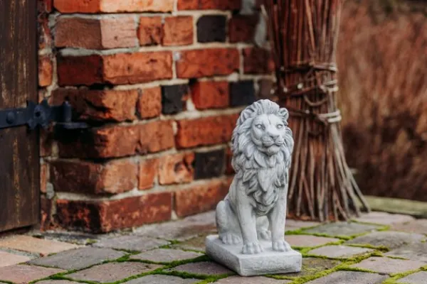 Gartendekoparadies Animaux-Lion assis