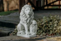 Gartendekoparadies Animaux-Lion avec bouclier sur la patte gauche