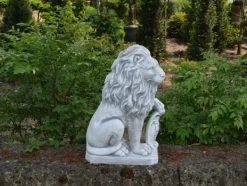 Gartendekoparadies Animaux-Lion avec bouclier sur la patte gauche