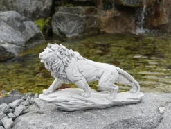Gartendekoparadies Animaux-Lion debout sur un rocher