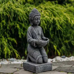 Gartendekoparadies Bouddhas-Statue de Bouddha enchanteresse sur un piédestal