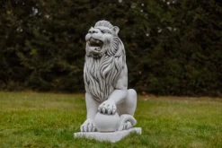Gartendekoparadies Animaux-Statue de lion à gauche avec ballon