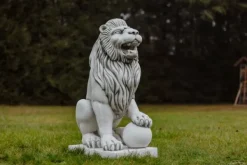 Gartendekoparadies Animaux-Statue de lion à gauche avec ballon