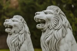 Gartendekoparadies Animaux-Statue de lion à gauche avec ballon