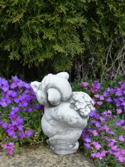 Gartendekoparadies Trolls-Troll avec un somptueux bouquet de fleurs