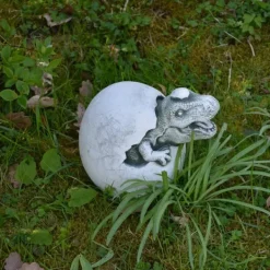 Gartendekoparadies Animaux-Un petit dinosaure sort de l'œuf